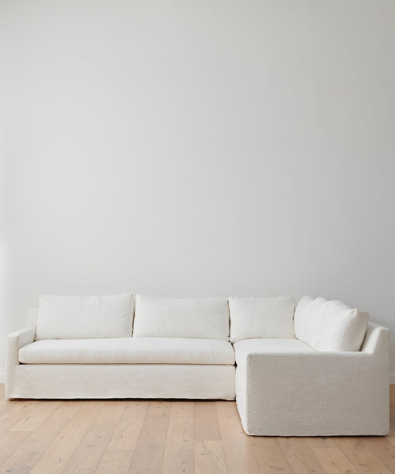 https://cdn.shopify.com/s/files/1/0565/1234/8333/products/JenniKayne_HarborSectional_Ivory-001.jpg?v=1762182569