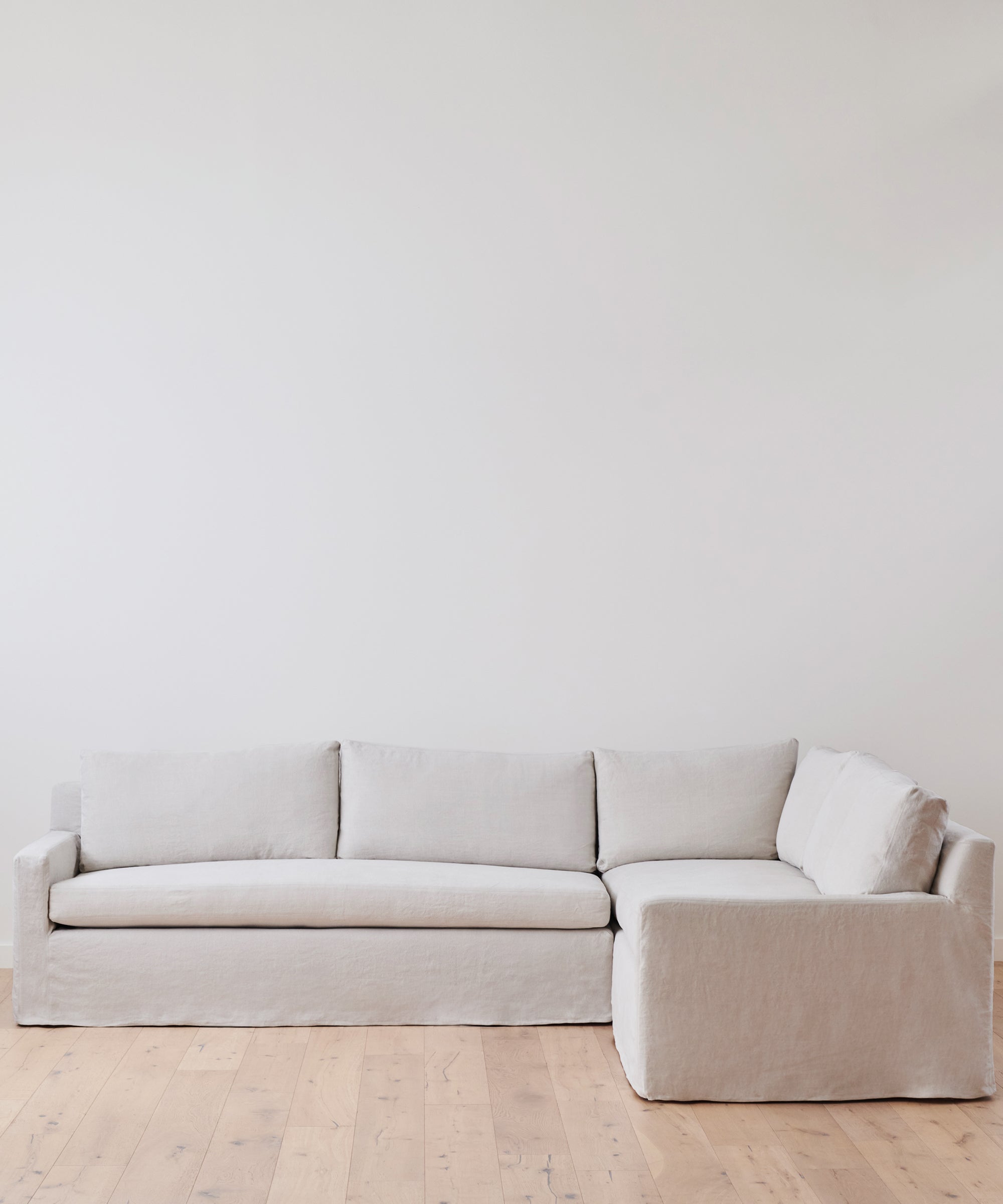 https://cdn.shopify.com/s/files/1/0565/1234/8333/products/JenniKayne_HarborSectional_NaturalLinen1.jpg?v=1762182569