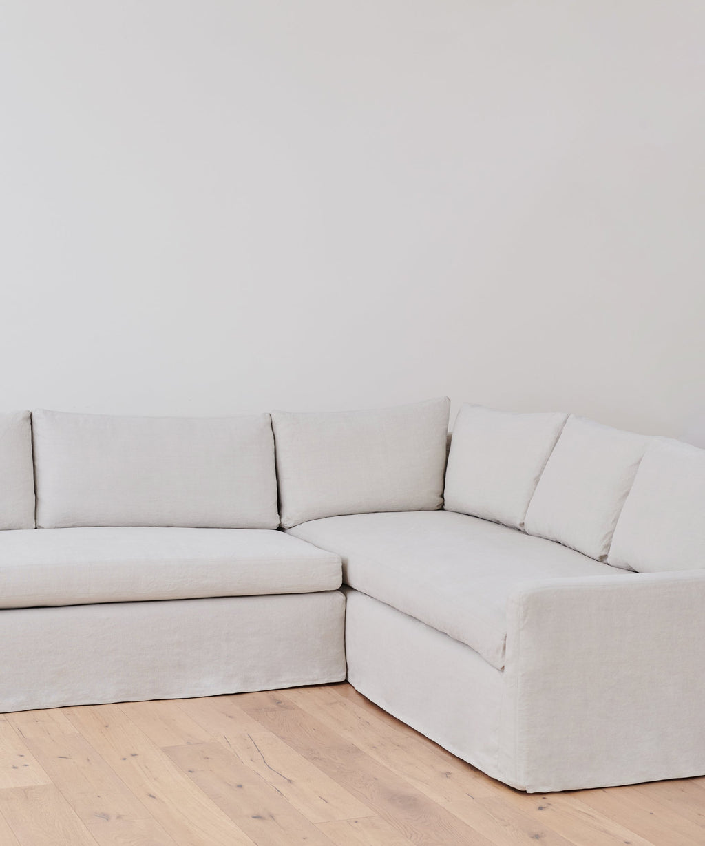 https://cdn.shopify.com/s/files/1/0565/1234/8333/products/JenniKayne_HarborSectional_NaturalLinen3.jpg?v=1659477620
