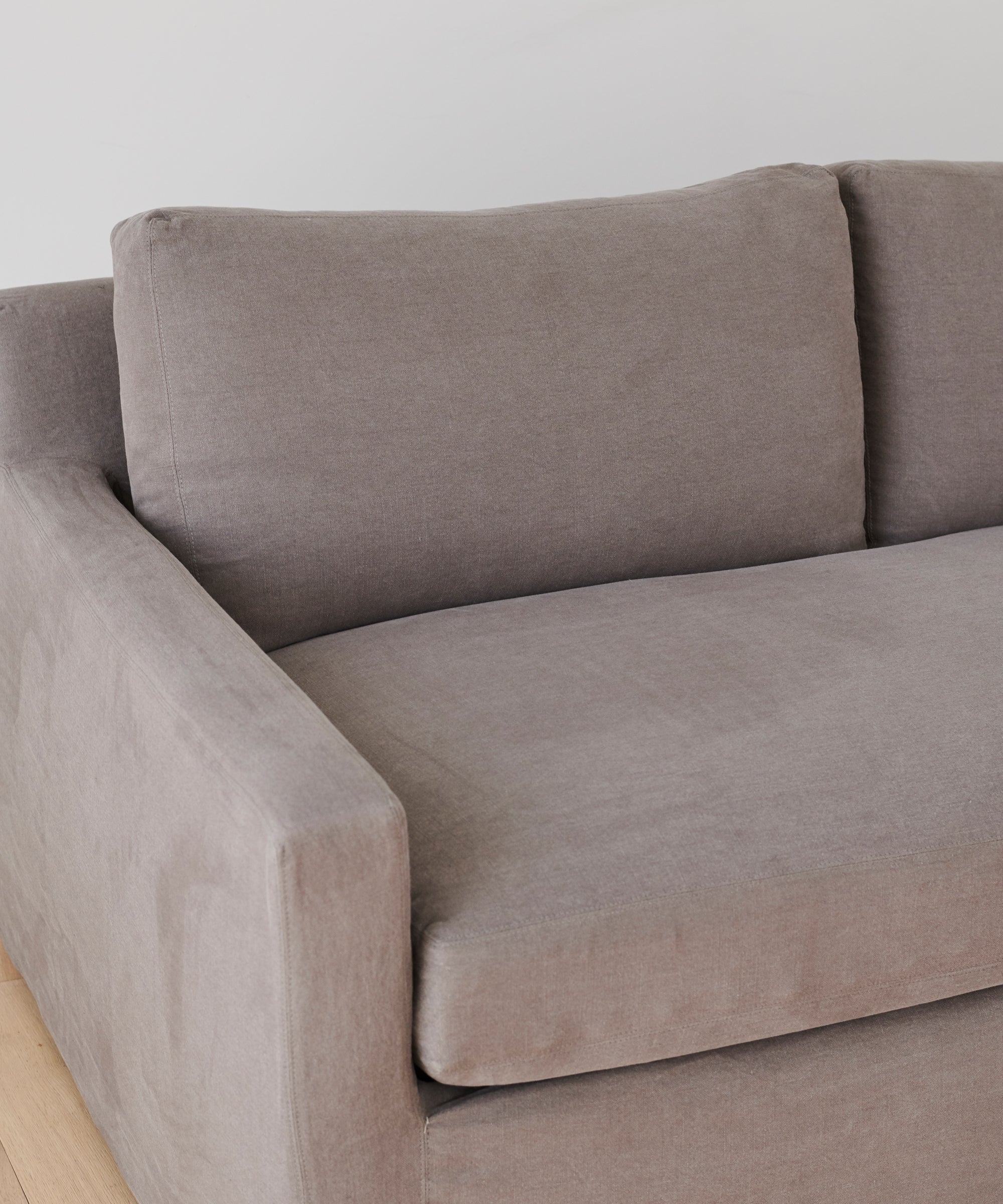 https://cdn.shopify.com/s/files/1/0565/1234/8333/products/JenniKayne_HarborSofa_Charcoal-02.jpg?v=1661950963