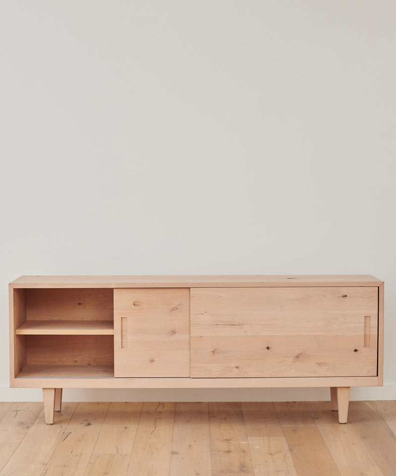 https://cdn.shopify.com/s/files/1/0565/1234/8333/products/JenniKayne_MandevilleCredenza_KnottyAlder-001.jpg?v=1762182596