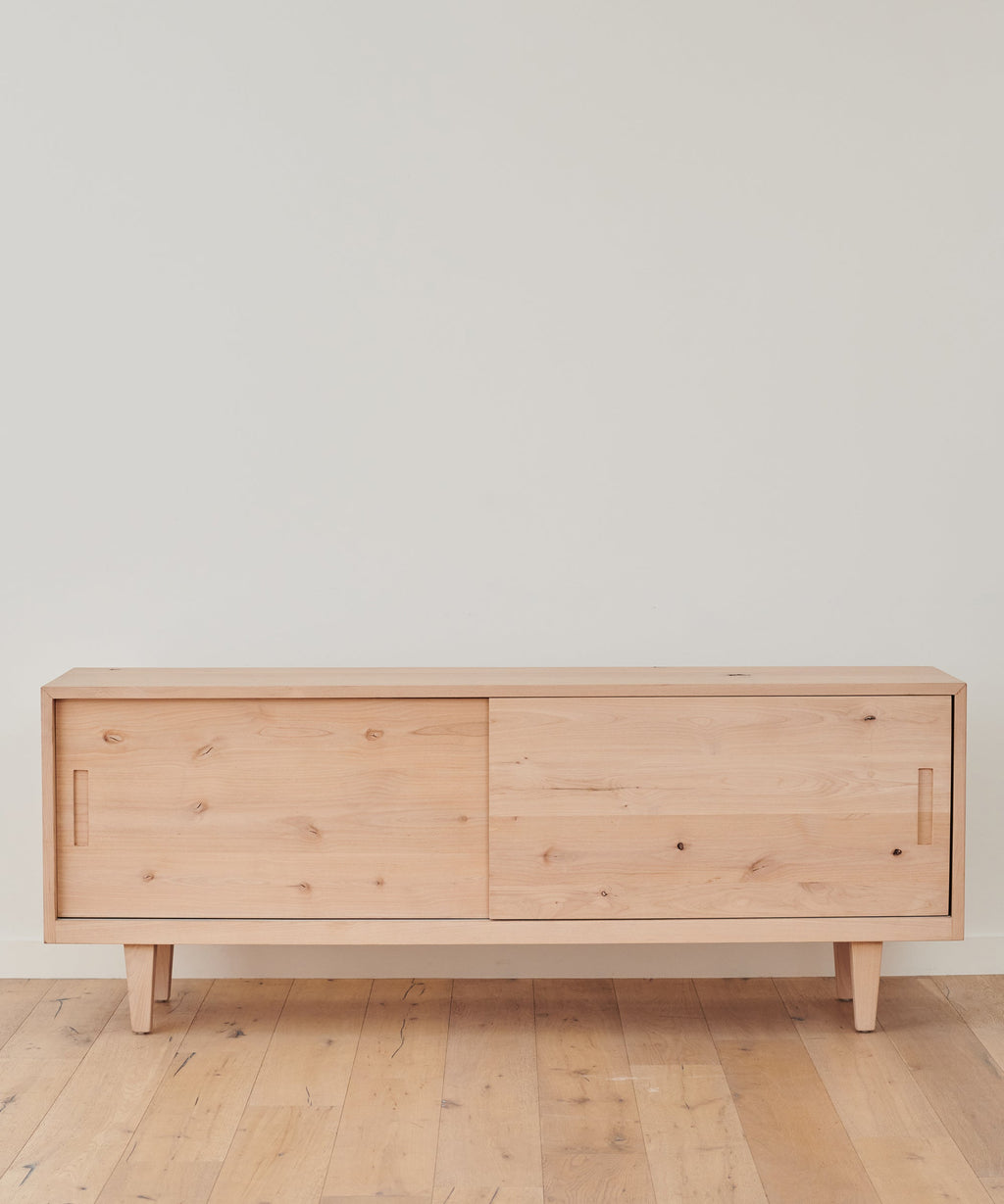 https://cdn.shopify.com/s/files/1/0565/1234/8333/products/JenniKayne_MandevilleCredenza_KnottyAlder-2.jpg?v=1642531895