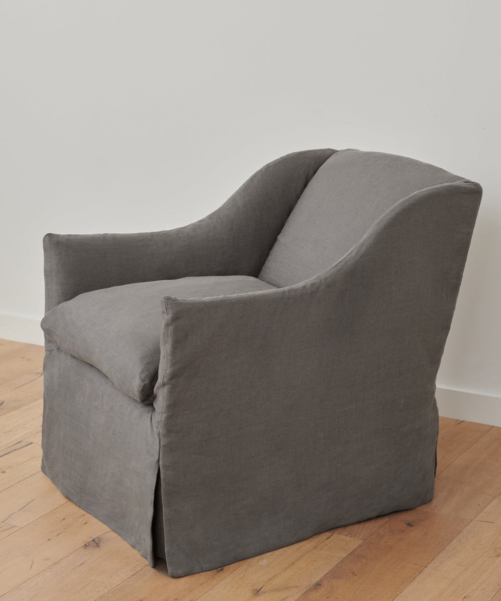 https://cdn.shopify.com/s/files/1/0565/1234/8333/products/JenniKayne_MiramarChair_SmokeLinen-2.jpg?v=1639426728