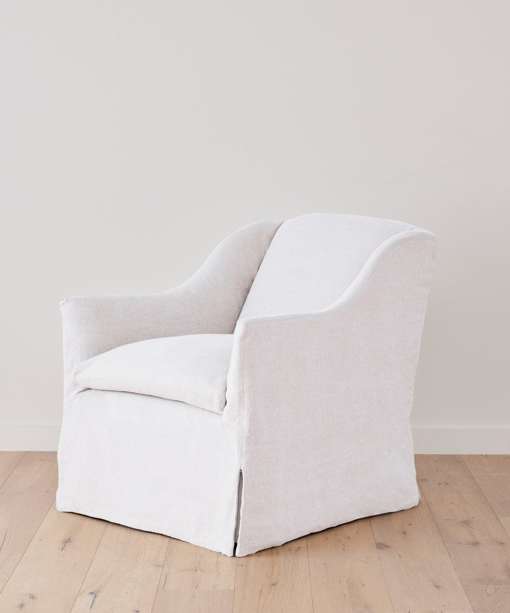 https://cdn.shopify.com/s/files/1/0565/1234/8333/products/JenniKayne_MiramarChair_White1.jpg?v=1762182579