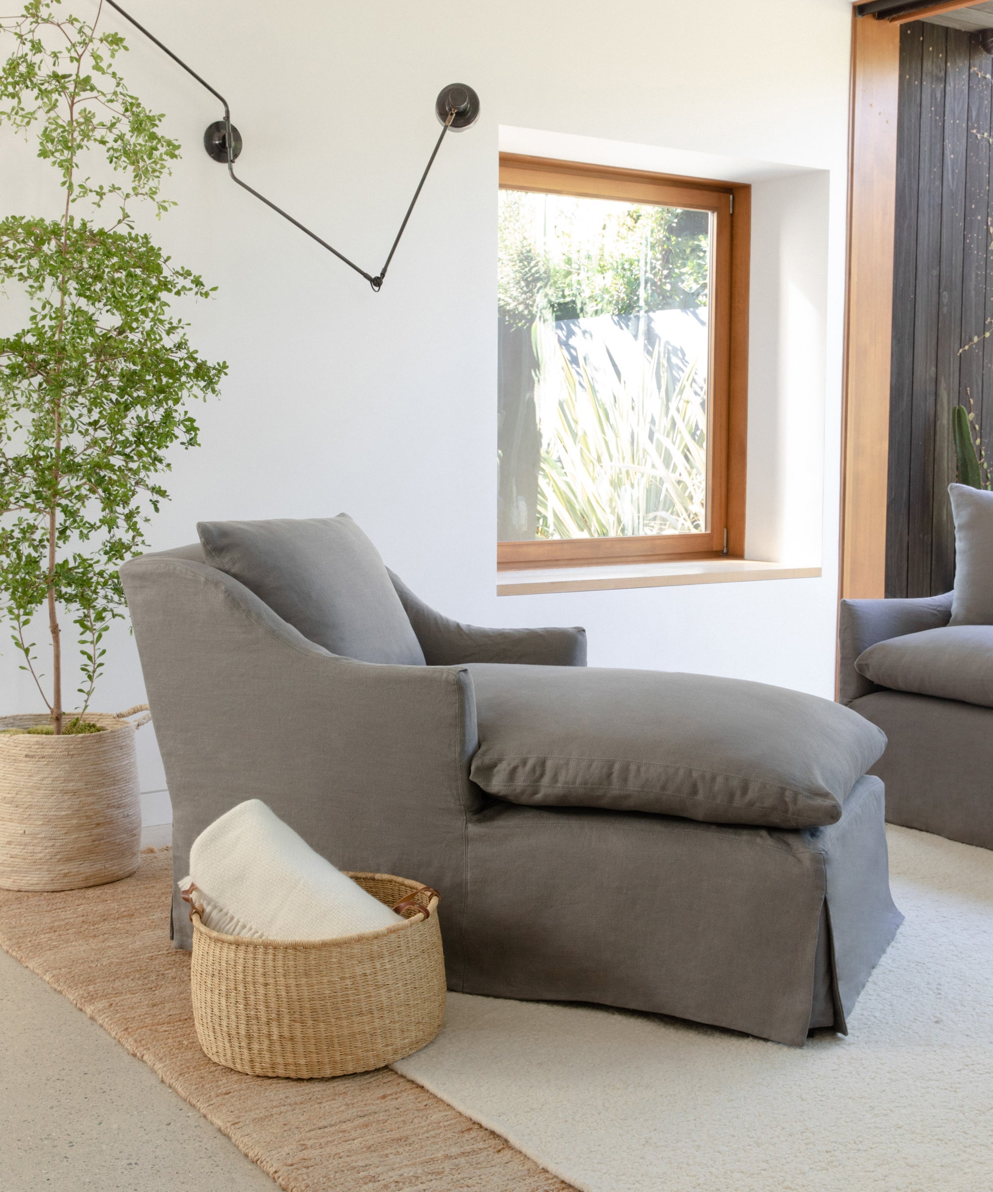 https://cdn.shopify.com/s/files/1/0565/1234/8333/products/JenniKayne_MiramarChaise_SmokeLinen-4.jpg?v=1640015753