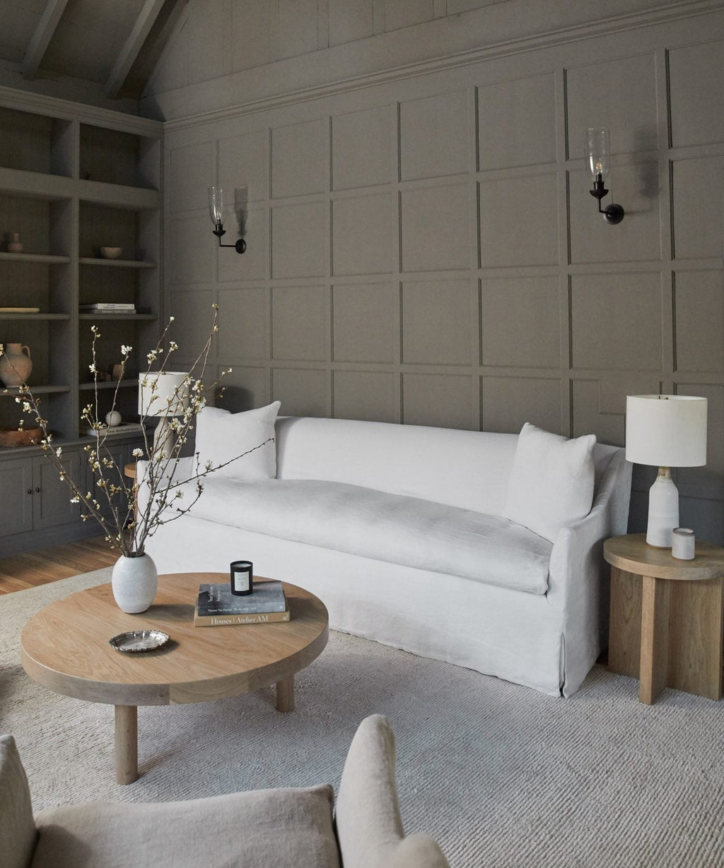 https://cdn.shopify.com/s/files/1/0565/1234/8333/products/JenniKayne_MiramarSofa_WhiteLinen-4.jpg?v=1663081583