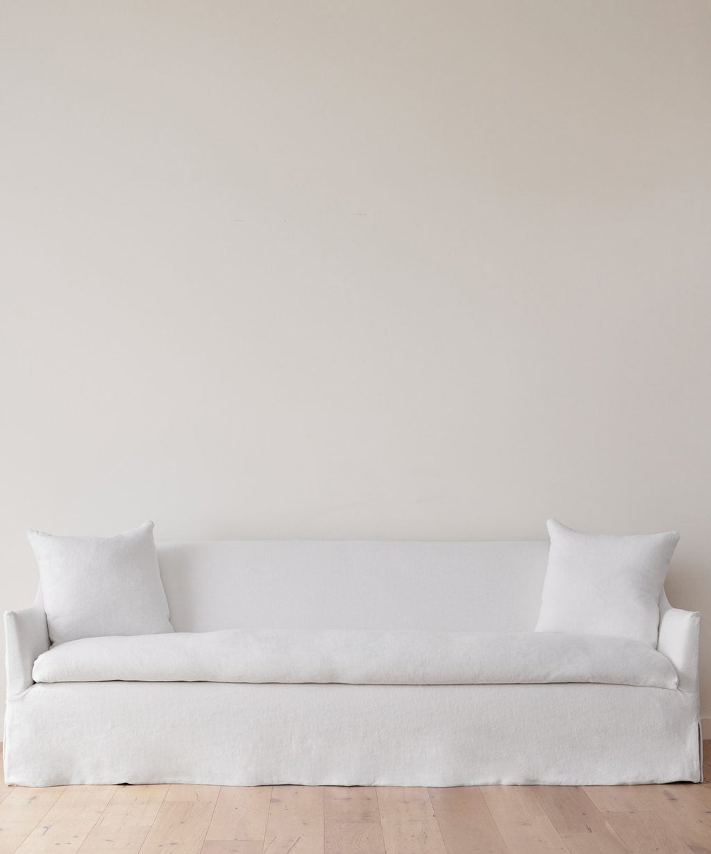 https://cdn.shopify.com/s/files/1/0565/1234/8333/products/JenniKayne_MiramarSofa_WhiteLinen1.jpg?v=1762182575
