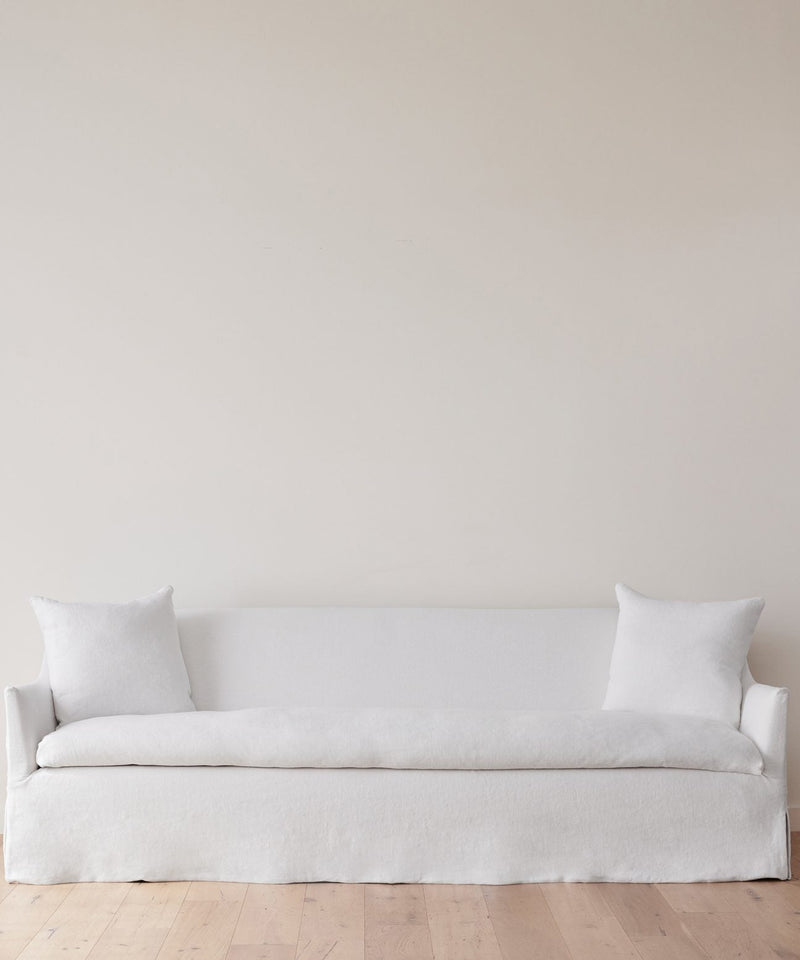 https://cdn.shopify.com/s/files/1/0565/1234/8333/products/JenniKayne_MiramarSofa_WhiteLinen1.jpg?v=1762182575