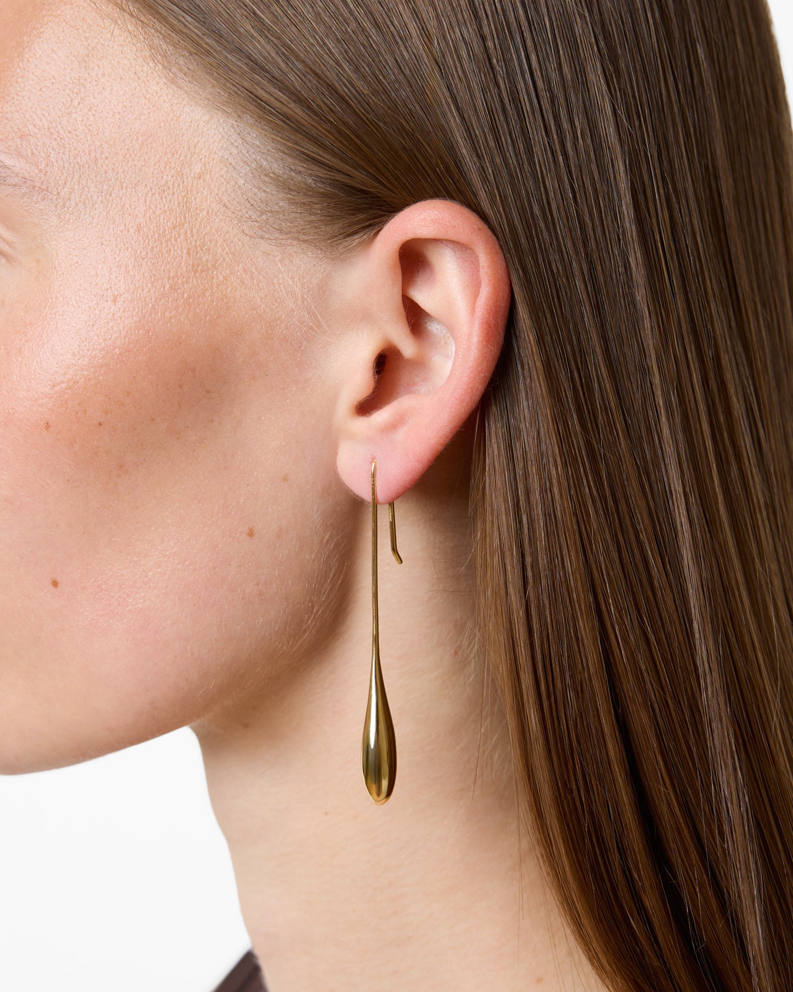 https://cdn.shopify.com/s/files/1/0592/5945/3598/files/LILI_EARRINGS_GOLD2.jpg?v=1778572462