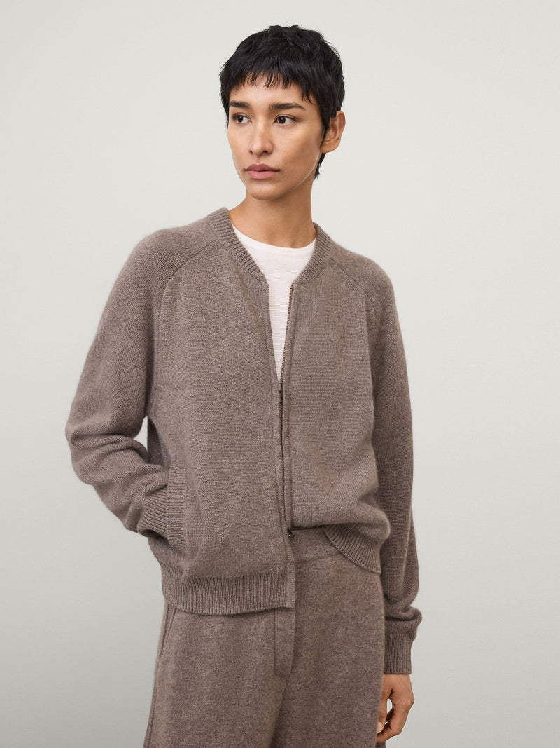 https://cdn.shopify.com/s/files/1/0569/2797/7653/files/LISAYANG_SS26_WW_DROP-1_2026001TL_NESSIE_ZIP_CARDIGAN_JACKET_PLAIN_KNIT_TRUFFLE_266.jpg?v=1768294493