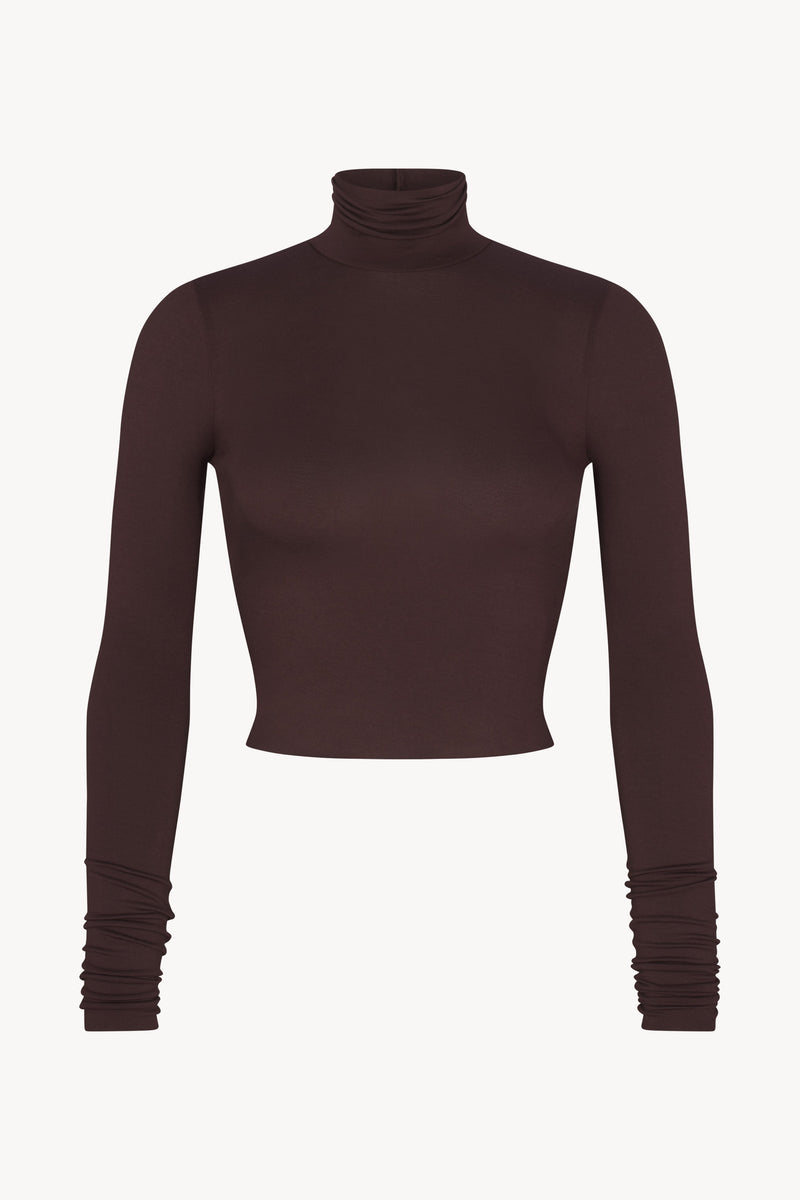 https://cdn.shopify.com/s/files/1/0690/5403/8247/files/LONGSLEEVETURTLENECKCROPTOPESPRESSO.jpg?v=1751058244