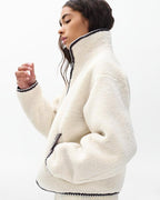 Cozy Ivory Sherpa Zip-Up Jacket: Plush Bomber Fit, Faux-Leather Trim, Ultimate Comfort