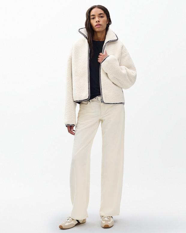 Cozy Ivory Sherpa Zip-Up Jacket: Plush Bomber Fit, Faux-Leather Trim, Ultimate Comfort