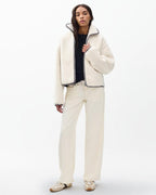 Cozy Ivory Sherpa Zip-Up Jacket: Plush Bomber Fit, Faux-Leather Trim, Ultimate Comfort