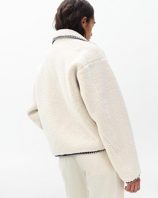 Cozy Ivory Sherpa Zip-Up Jacket: Plush Bomber Fit, Faux-Leather Trim, Ultimate Comfort