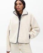 Cozy Ivory Sherpa Zip-Up Jacket: Plush Bomber Fit, Faux-Leather Trim, Ultimate Comfort