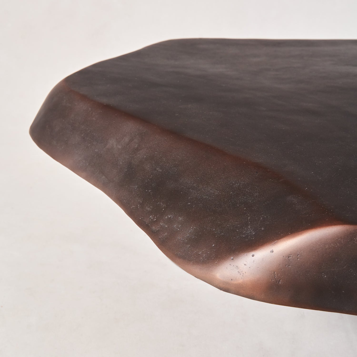 https://cdn.shopify.com/s/files/1/0593/2217/1565/files/Meteorite-Bronze-Coffee-Table-11.jpg?v=1773084263