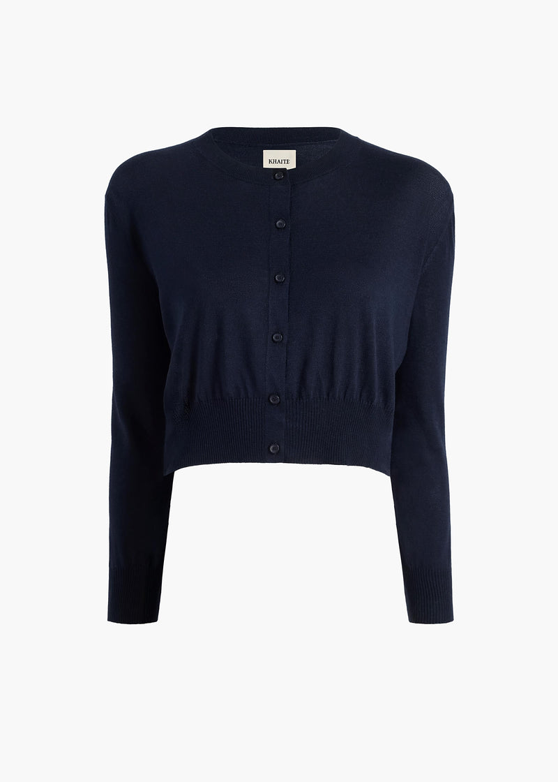 https://cdn.shopify.com/s/files/1/1519/7996/files/NADYNE-CARDIGAN_MIDNIGHT-NAVY_18152329-358_GHOST.jpg?v=1768488353