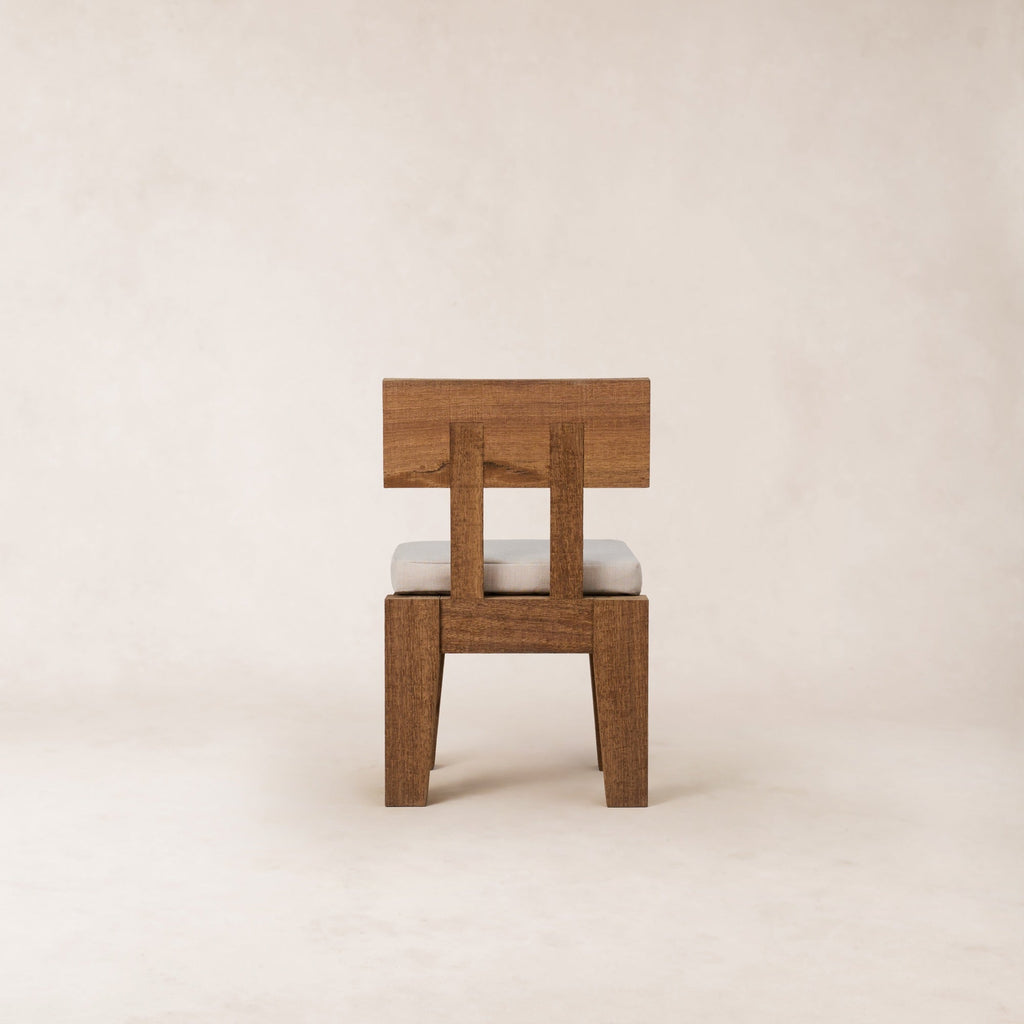 https://cdn.shopify.com/s/files/1/0593/2217/1565/files/OliChair_Back_SolidBasralocus_Outdoor.jpg?v=1772564659