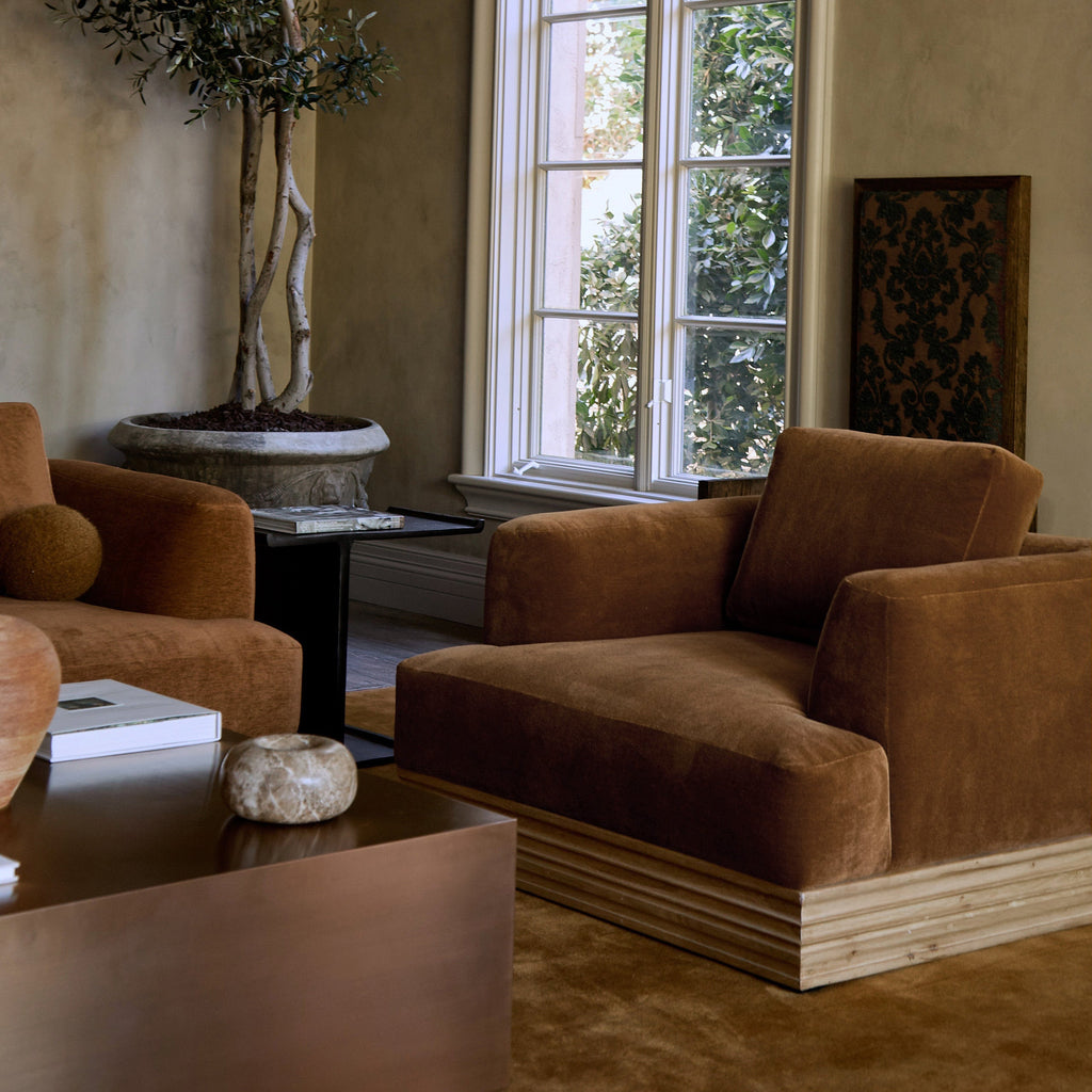 https://cdn.shopify.com/s/files/1/0593/2217/1565/files/Palazzo-Mohair-Wood-Base-Armchair-Copper-Lifestyle.jpg?v=1740502897