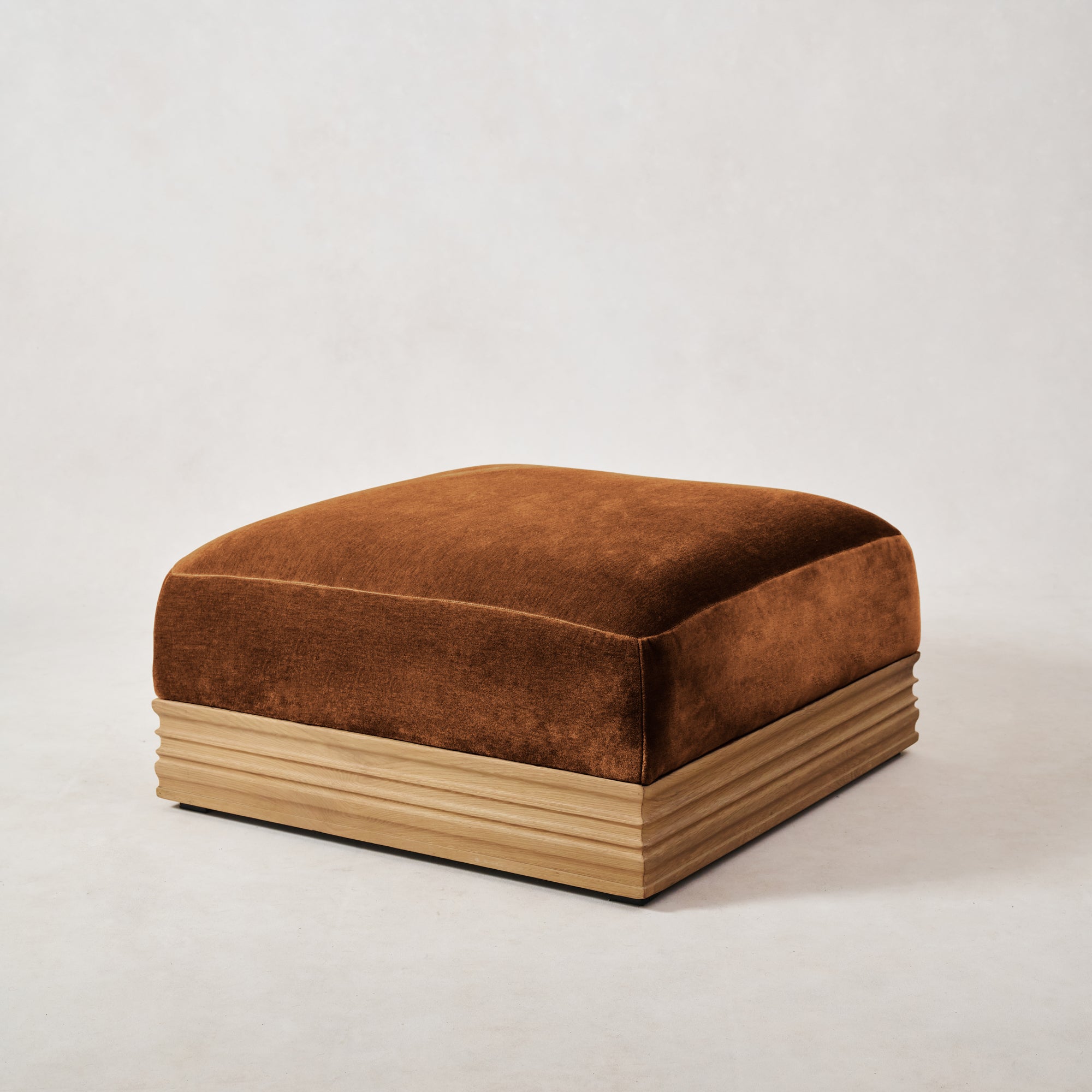 https://cdn.shopify.com/s/files/1/0593/2217/1565/files/Palazzo-Mohair-Wood-Base-Ottoman-Ambra-2.jpg?v=1740460617