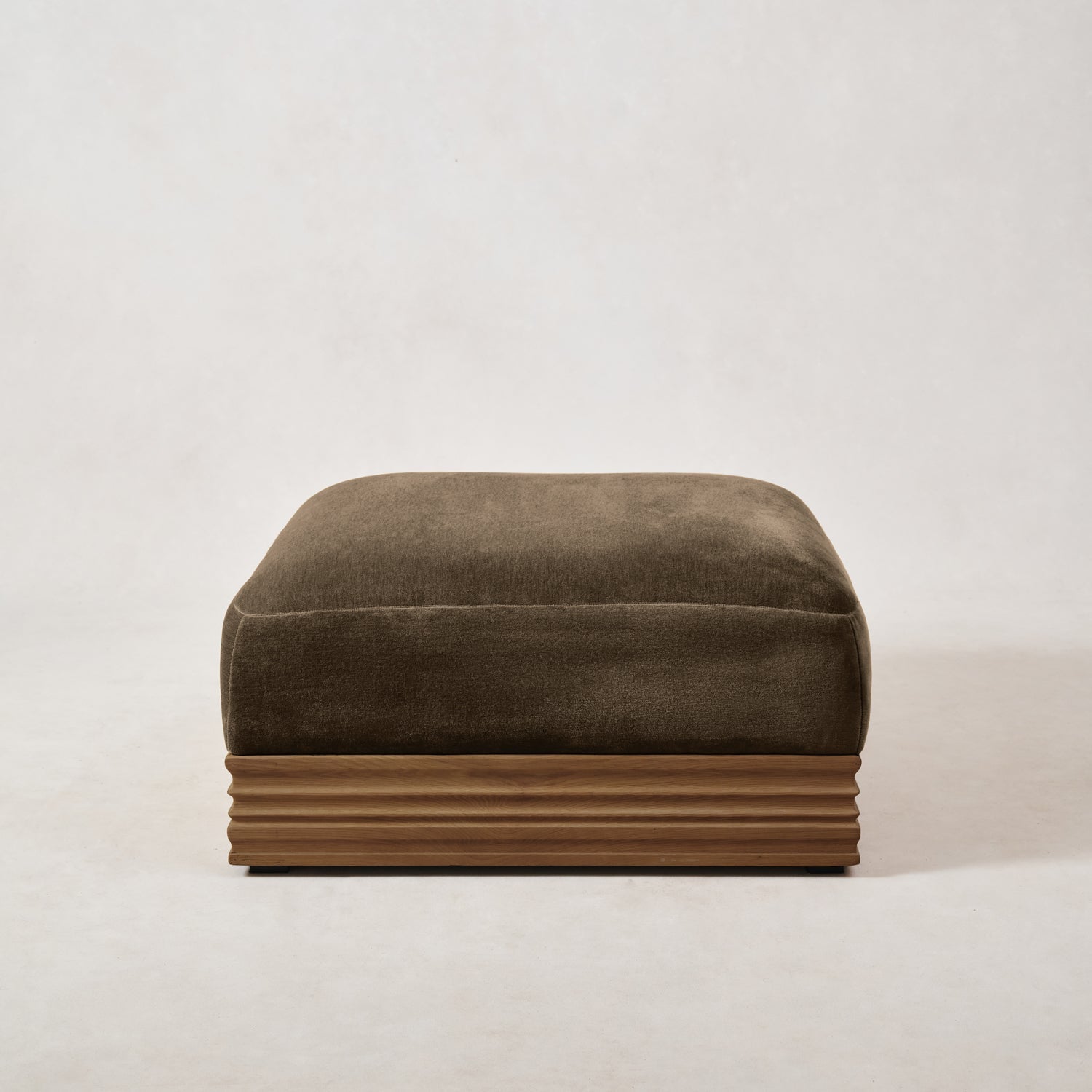 https://cdn.shopify.com/s/files/1/0593/2217/1565/files/Palazzo-Mohair-Wood-Base-Ottoman-Truffle-1.jpg?v=1740460617