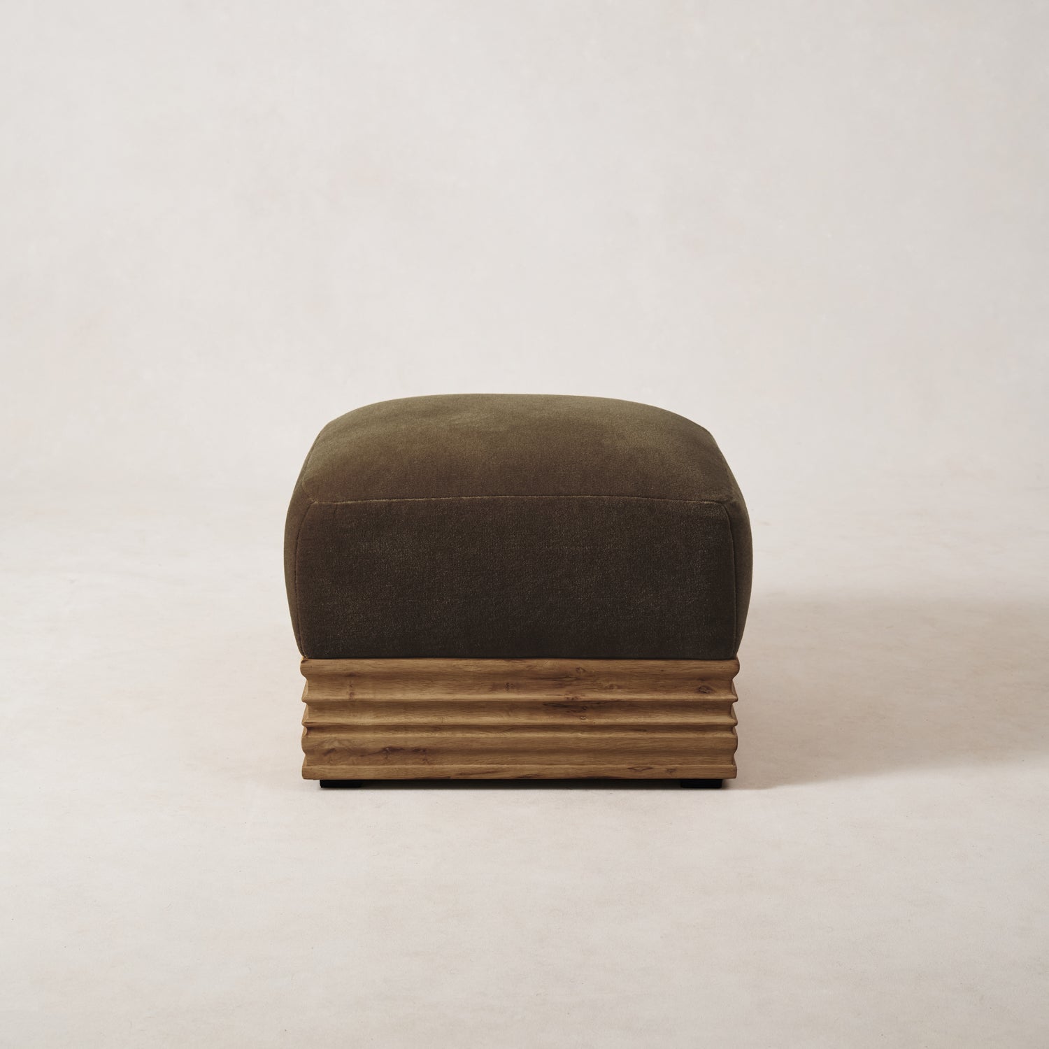 https://cdn.shopify.com/s/files/1/0593/2217/1565/files/Palazzo-mohair-wood-base-pouf-truffle-1.jpg?v=1740460294