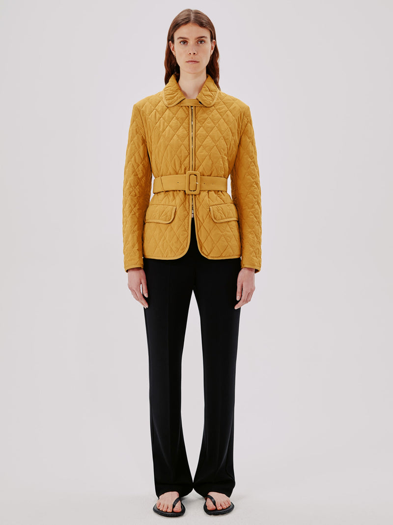 https://cdn.shopify.com/s/files/1/0285/3640/6109/products/SHORT_QUILTED_JACKET_GOLDENROD_A423JK014-CO-GDR2.jpg?v=1744042829