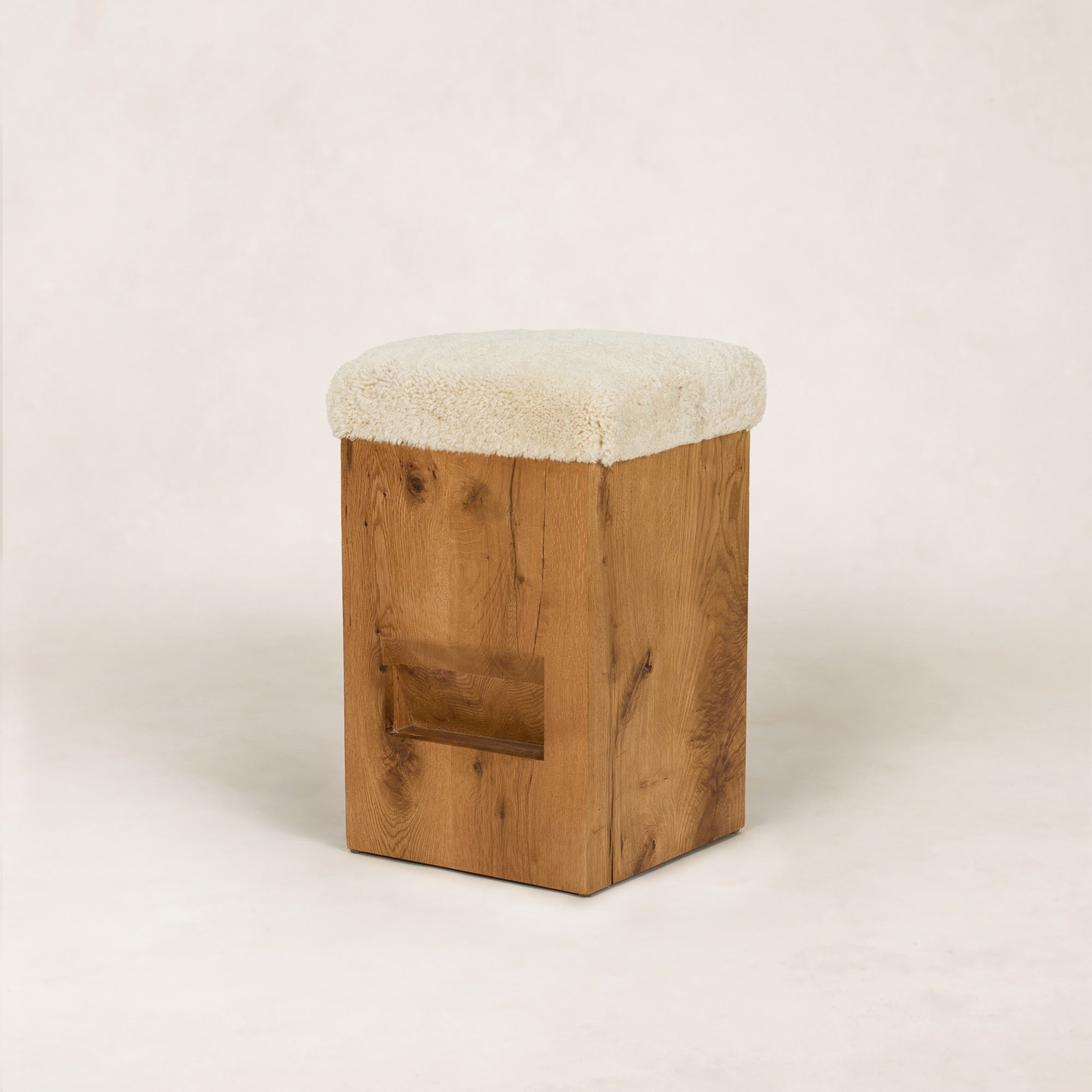 https://cdn.shopify.com/s/files/1/0593/2217/1565/files/SherpaCounterStool_3_4_SolidOak_Shearling_7c47e32a-85d7-4072-a2f4-8b3af0a0cebc.jpg?v=1772497214