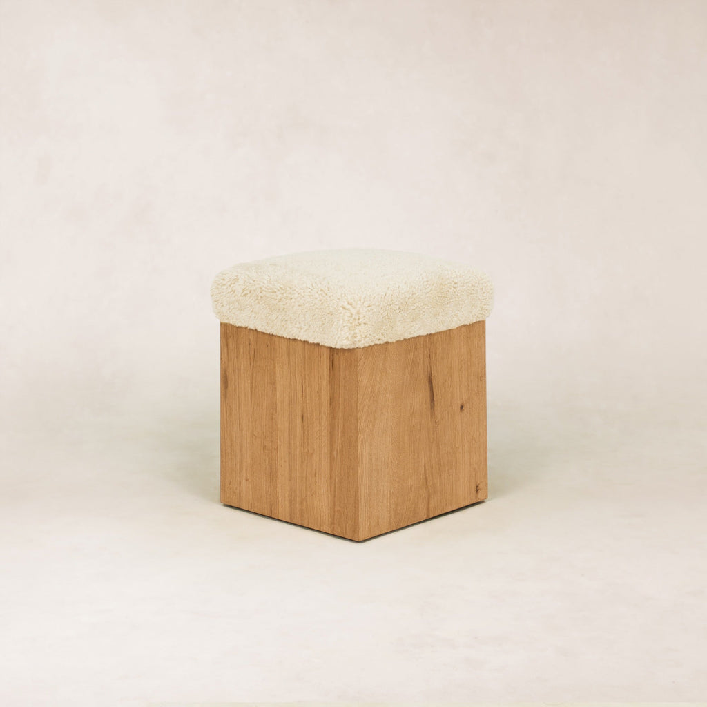 https://cdn.shopify.com/s/files/1/0593/2217/1565/files/SherpaOttomanStool_3_4Top_SolidOak_Shearling.jpg?v=1772496999