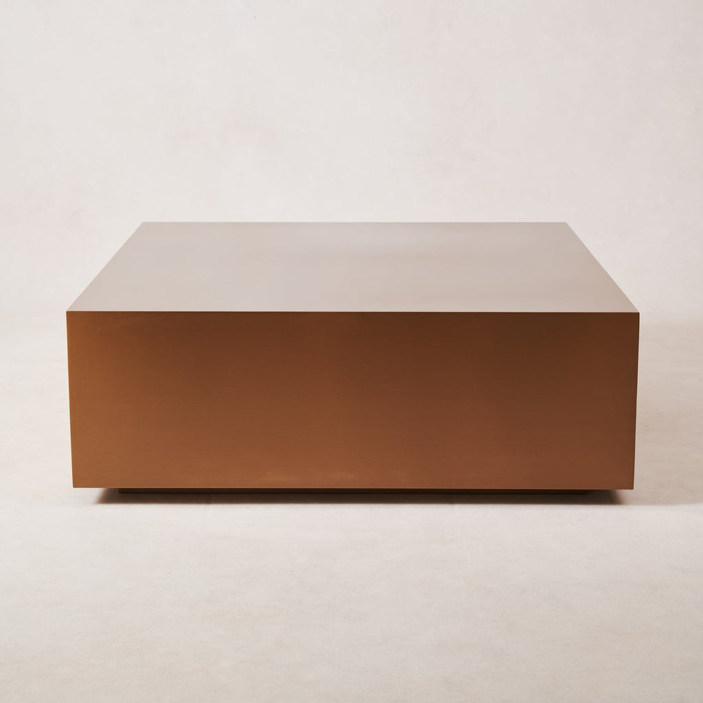 https://cdn.shopify.com/s/files/1/0593/2217/1565/files/Stainless-Steel-Copper-Coffee-Table-Square-1.jpg?v=1739402146