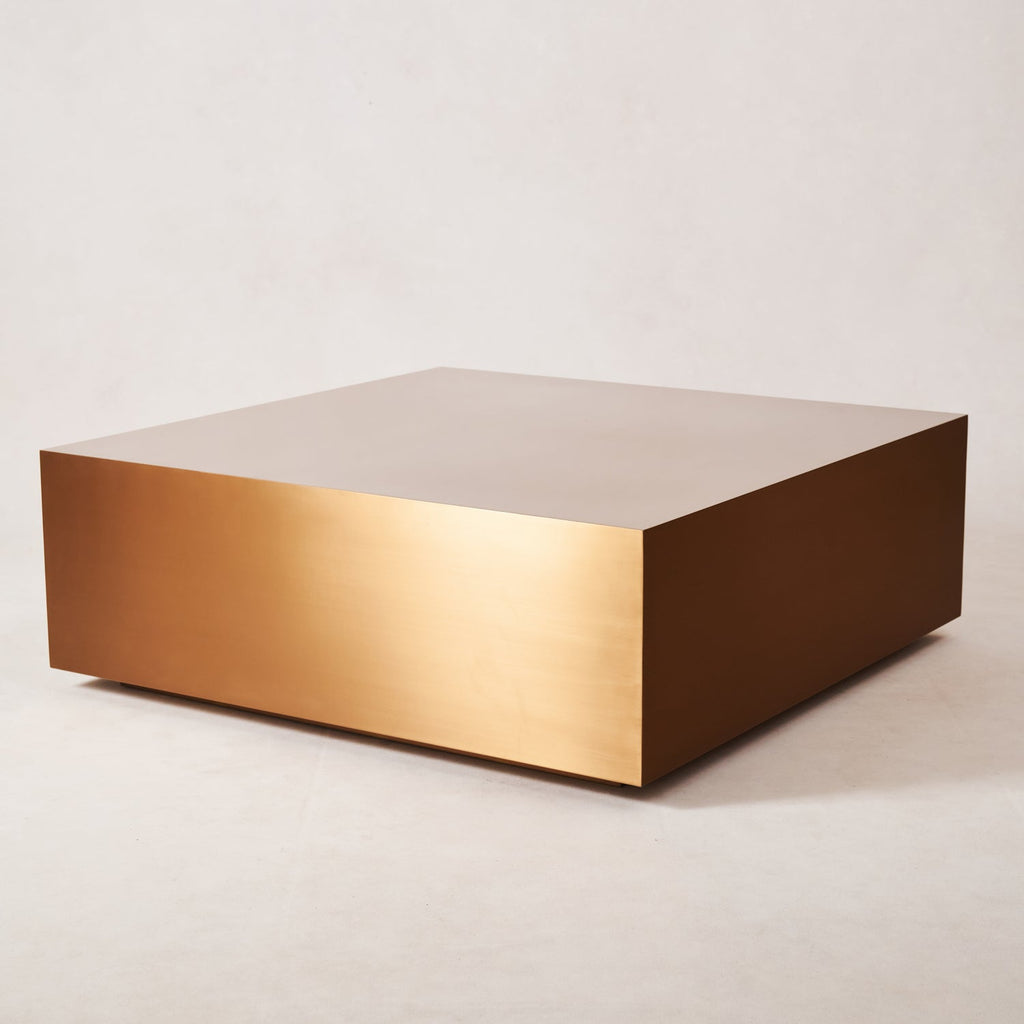 https://cdn.shopify.com/s/files/1/0593/2217/1565/files/Stainless-Steel-Copper-Coffee-Table-Square-2.jpg?v=1740455573