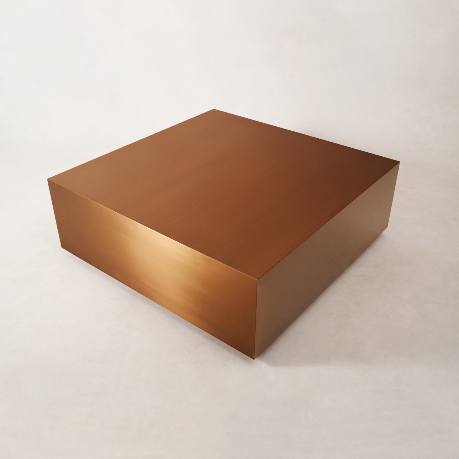 https://cdn.shopify.com/s/files/1/0593/2217/1565/files/Stainless-Steel-Copper-Coffee-Table-Square-9.jpg?v=1740455573