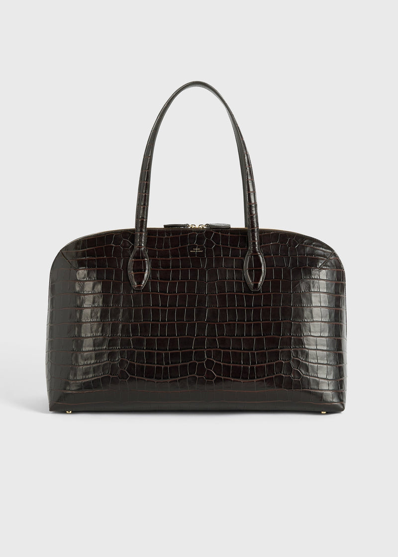 https://cdn.shopify.com/s/files/1/0452/1374/5316/files/TOTEME_ECOM_SS25_GARDEROB_BAGS_CROCO-EMBOSSED_DAY_TOTE_252-WAL0082-LE0076_DARKCHOCOLATE_front_GB.jpg?v=1734597364