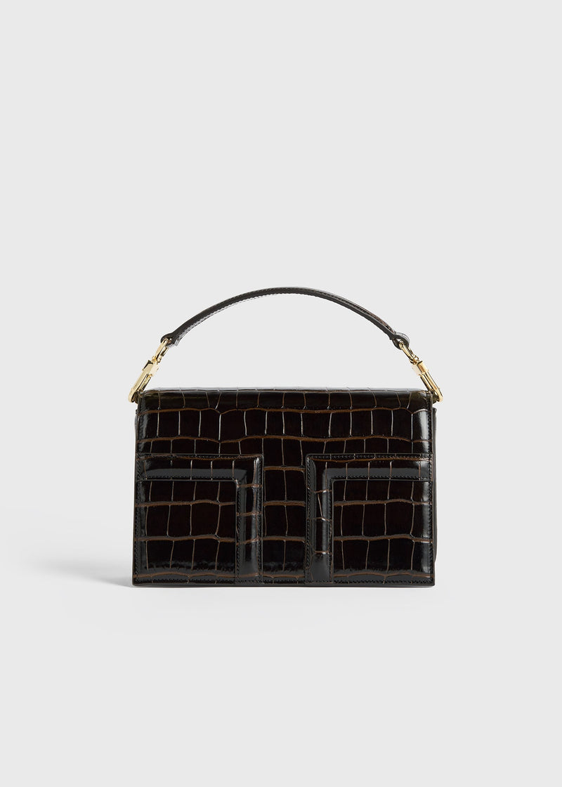 https://cdn.shopify.com/s/files/1/0452/1374/5316/files/TOTEME_FLATS_FW24_BAGS_244-WAL0051-LE0076_MINI_T-FLAP_BAG_DARK_BROWN_CROCO_front_GB.jpg?v=1721745059