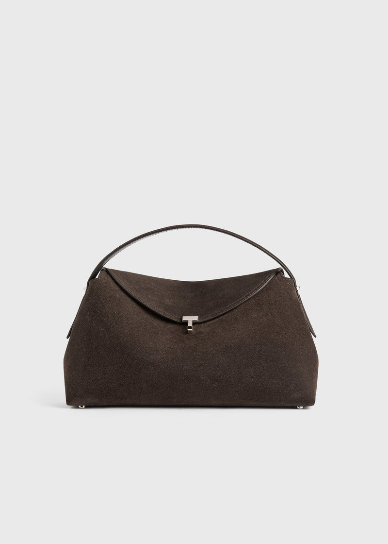 https://cdn.shopify.com/s/files/1/0452/1374/5316/files/TOTEME_FLATS_FW25__BAG_EXCLUSIVES_241-WAL961-LE0004-102_T-LOCK_SUEDE_TOP_HANDLE_BROWN_front_GB.jpg?v=1752132591