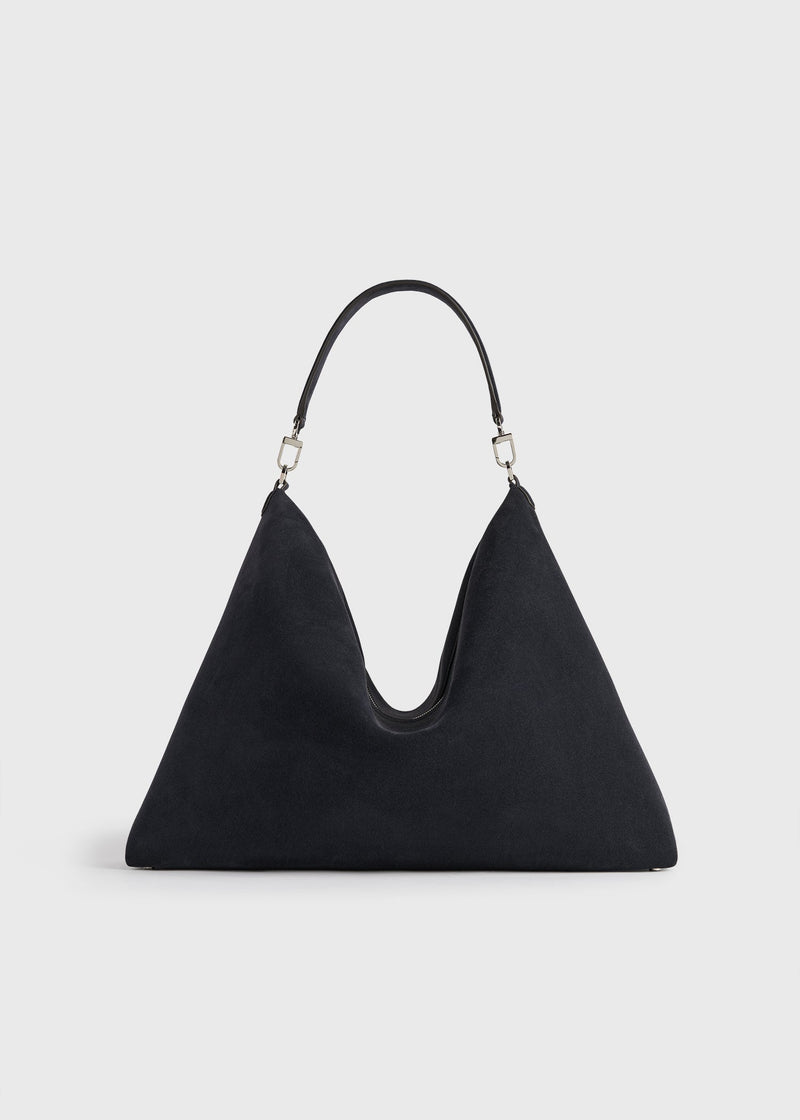 https://cdn.shopify.com/s/files/1/0452/1374/5316/files/TOTEME_FLATS_FW25__BAG_EXCLUSIVES_254-WAL0098-LE0155_SUEDE_SCOOP_BAG_NAVY_front_GB.jpg?v=1752131700