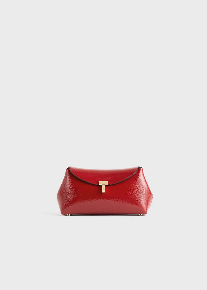 https://cdn.shopify.com/s/files/1/0452/1374/5316/files/TOTEME_FLATS_FW25__BAG_SEASONAL_254-WAL0085-LE0164_MINI_T-LOCK_NAPLACK_CLUTCH_RED_front_GB.jpg?v=1752131911