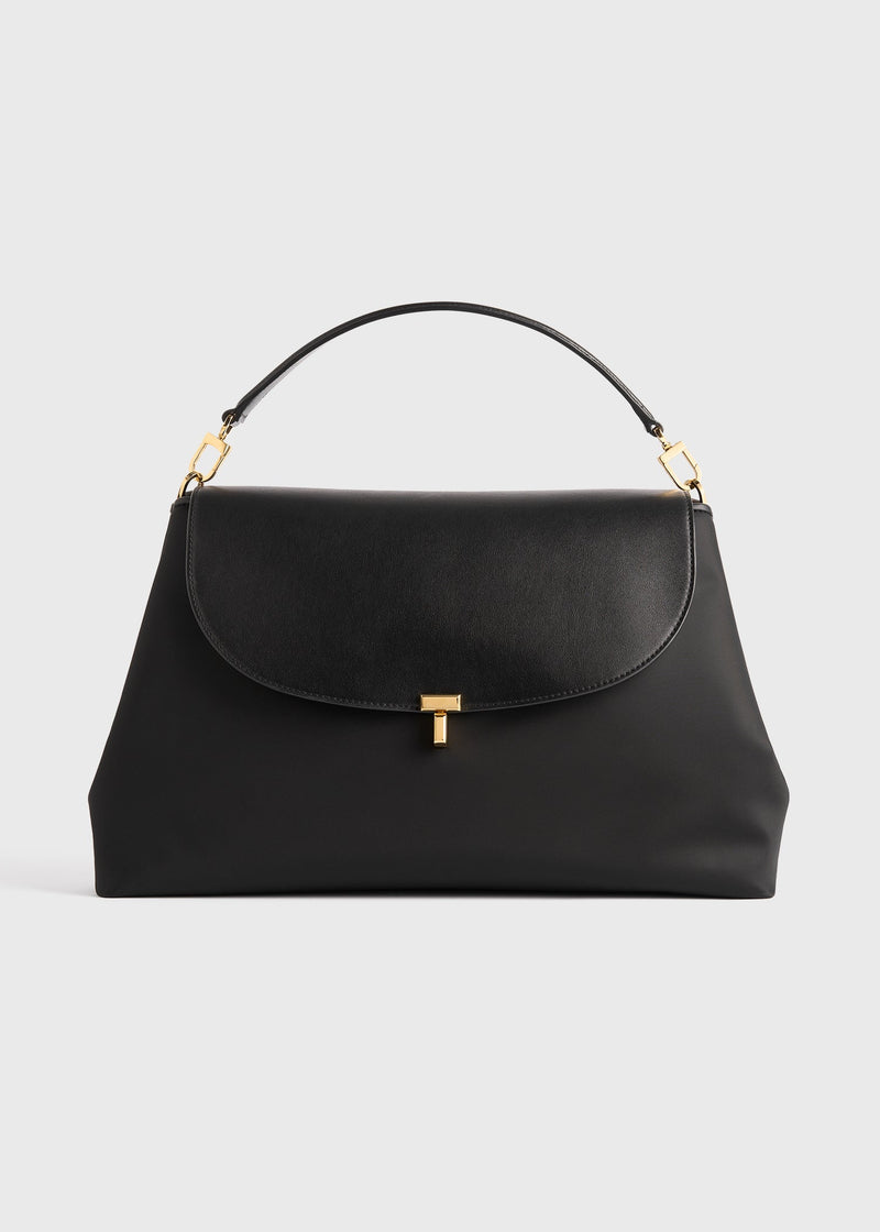https://cdn.shopify.com/s/files/1/0452/1374/5316/files/TOTEME_FLATS_FW25__BAG_SEASONAL_254-WAL0096-FB0182_T-LOCK_NYLON_SATCHEL_BLACK_front_GB_d9af7130-ffb6-4549-9cf5-0197e5ec1b22.jpg?v=1752131261