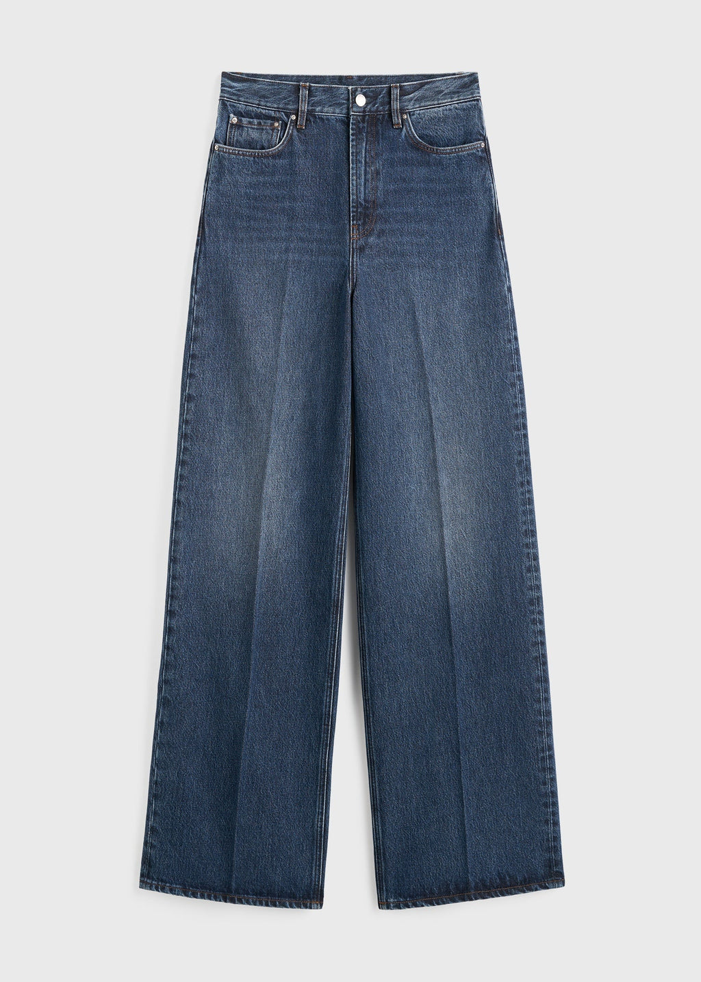 https://cdn.shopify.com/s/files/1/0480/1141/1607/files/TOTEME_FLATS_FW25__JEANS_SEASONAL_242-WRB2426-FB0045_WIDE_LEG_DENIM_DK_BLUE_front_GB_14727080-6950-404b-9994-a55d5d71f48c.jpg?v=1750935458
