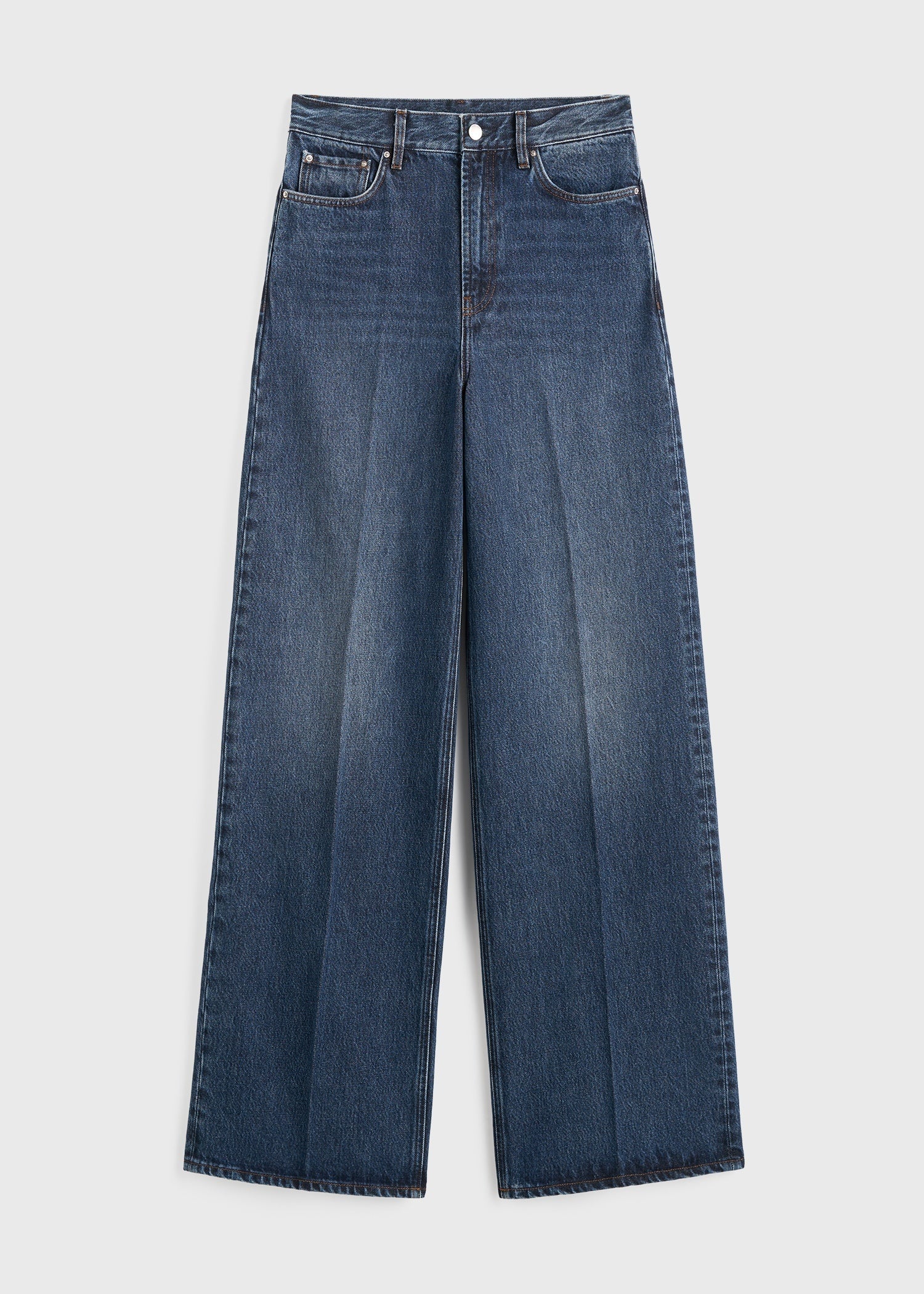 https://cdn.shopify.com/s/files/1/0480/1141/1607/files/TOTEME_FLATS_FW25__JEANS_SEASONAL_242-WRB2426-FB0045_WIDE_LEG_DENIM_DK_BLUE_front_GB_14727080-6950-404b-9994-a55d5d71f48c.jpg?v=1750935458