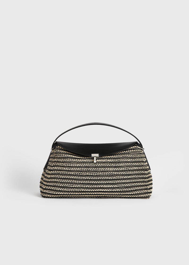 https://cdn.shopify.com/s/files/1/0452/1374/5316/files/TOTEME_FLATS_PF25_SEASONAL_BAGS_252-WAL961-LE0134_T-LOCK_TOP_HANDLE_COTTON_CANVAS_ECRUBLACK_front_GB.jpg?v=1744812574