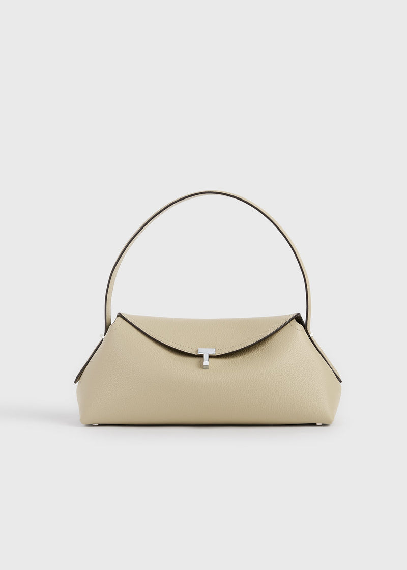 https://cdn.shopify.com/s/files/1/0452/1374/5316/files/TOTEME_FLATS_SS26_EXCLUSIVES_BAGS_261-WAL0127-LE0030-144_T_LOCK_GRAINED_LEATHER_SHOULDER_CASHEW_front_GB.jpg?v=1768823744
