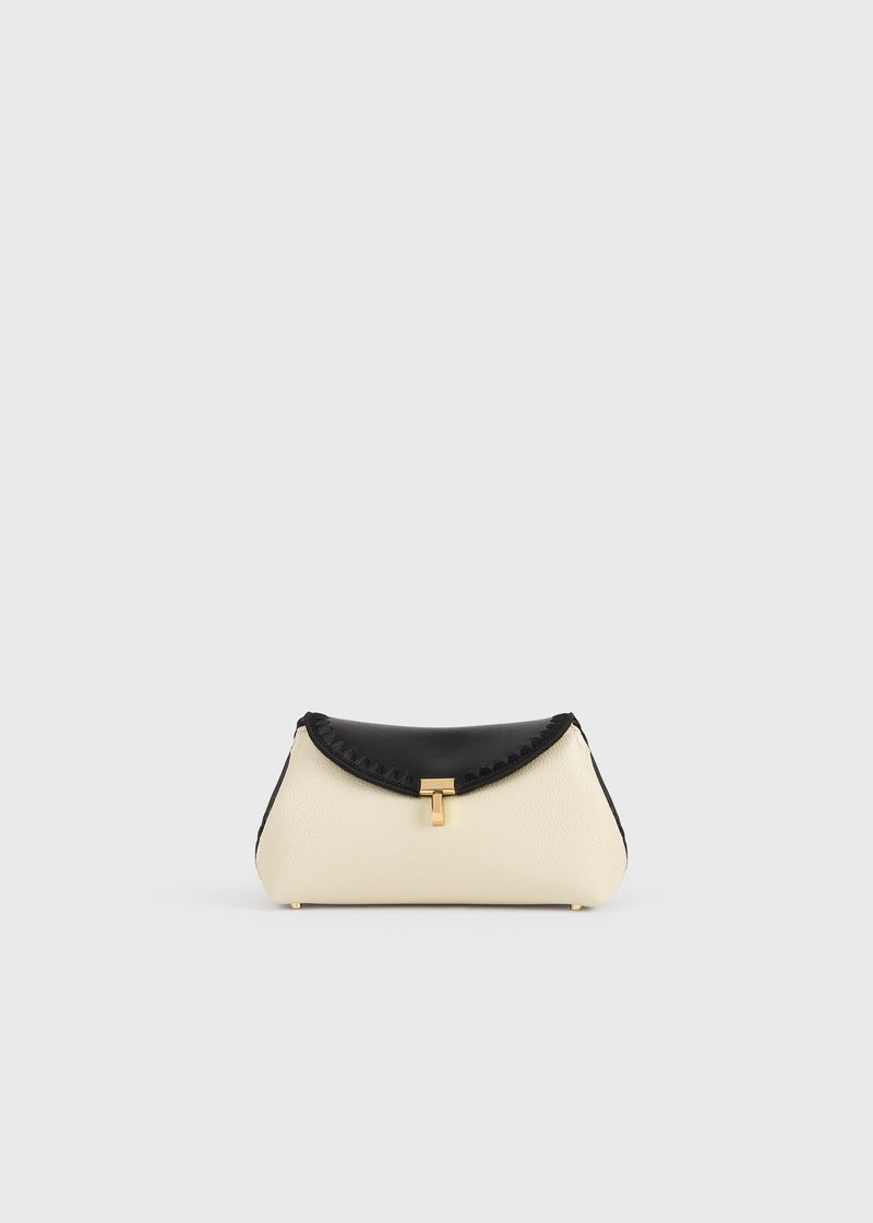 https://cdn.shopify.com/s/files/1/0452/1374/5316/files/TOTEME_FLATS__PS26_SEASONAL_BAGS_261-WAL0085-LE0030-349_MINI_T-LOCK_EMBROIDERED_LEATHER_CLUTCH_BLACK_MILK_front_GB_be4f9b8e-7570-4647-983d-299b828ae675.jpg?v=1760599692