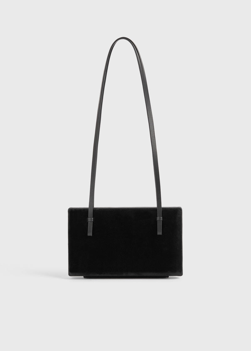 https://cdn.shopify.com/s/files/1/0452/1374/5316/files/TOTEME_FLATS__PS26_SEASONAL_BAGS_261-WAL0111-FB0437-001_COCKTAIL_VELVET_BAG_BLACK_front_GB.jpg?v=1760599716