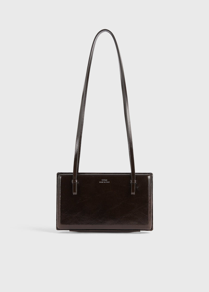 https://cdn.shopify.com/s/files/1/0452/1374/5316/files/TOTEME_FLATS__PS26_SEASONAL_BAGS_261-WAL0111-LE0020-213_COCKTAIL_NAPLACK_BAG_BARK_front_GB.jpg?v=1760599718