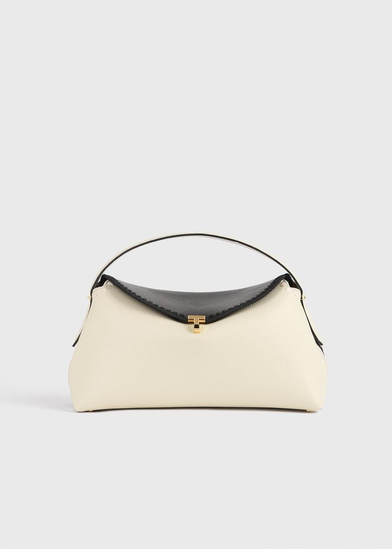 https://cdn.shopify.com/s/files/1/0452/1374/5316/files/TOTEME_FLATS__PS26_SEASONAL_BAGS_261-WAL961-LE0030-349_T-LOCK_EMBROIDERED_LEATHER_TOP_HANDLE_BLACK_MILK_front_GB.jpg?v=1760599722