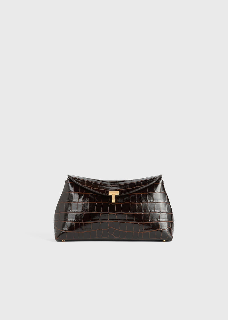 https://cdn.shopify.com/s/files/1/0452/1374/5316/files/TOTEME_PF24_BAGS_243-WAL944-LE0076_T-LOCK_CLUTCH_CROCO_DARK_BROWN_front_GB_3b154df5-afed-4c45-9b46-c4679c3ec3d3.jpg?v=1713959652