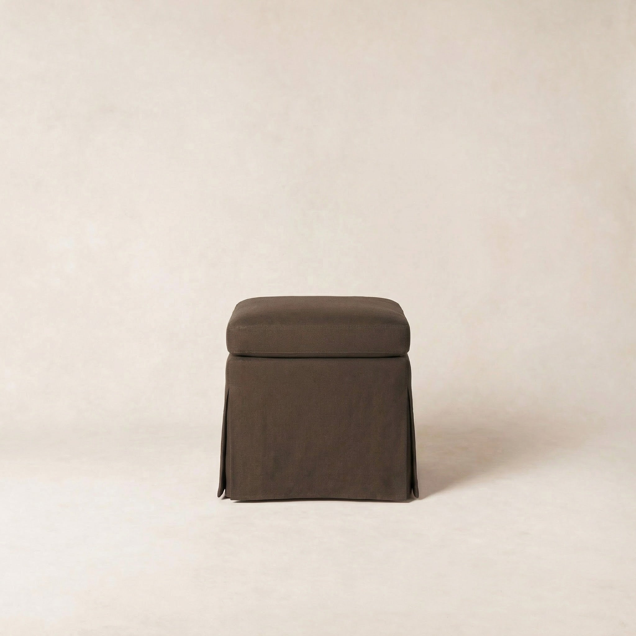 https://cdn.shopify.com/s/files/1/0593/2217/1565/files/antwerp-pouf-cocoa.jpg?v=1772503909