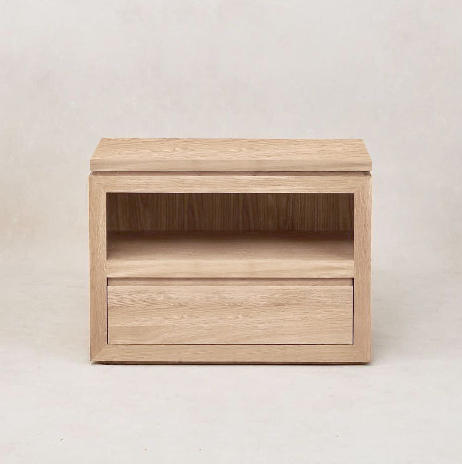 https://cdn.shopify.com/s/files/1/0593/2217/1565/files/bedside-table-with-drawer-2-wide.jpg?v=1744390659
